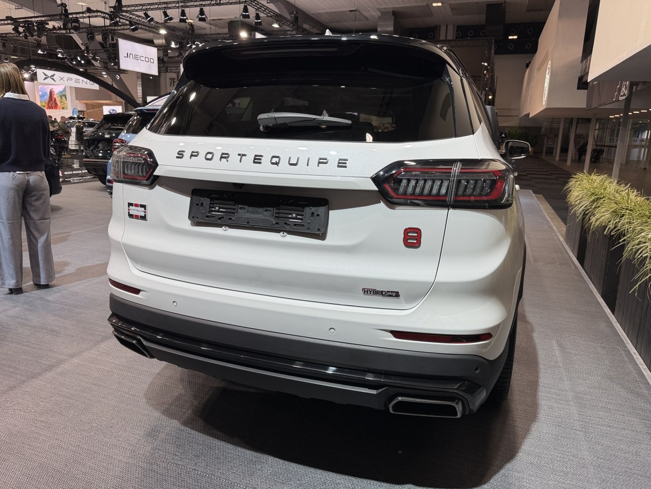 Rear view with hybrid badge, LED tail lights, dual exhaust