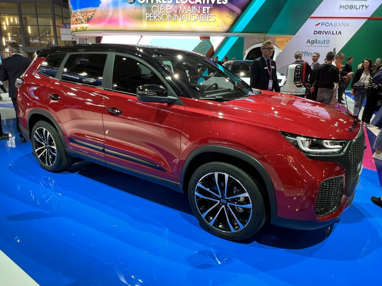 Red SUV with LED headlights and alloy wheels