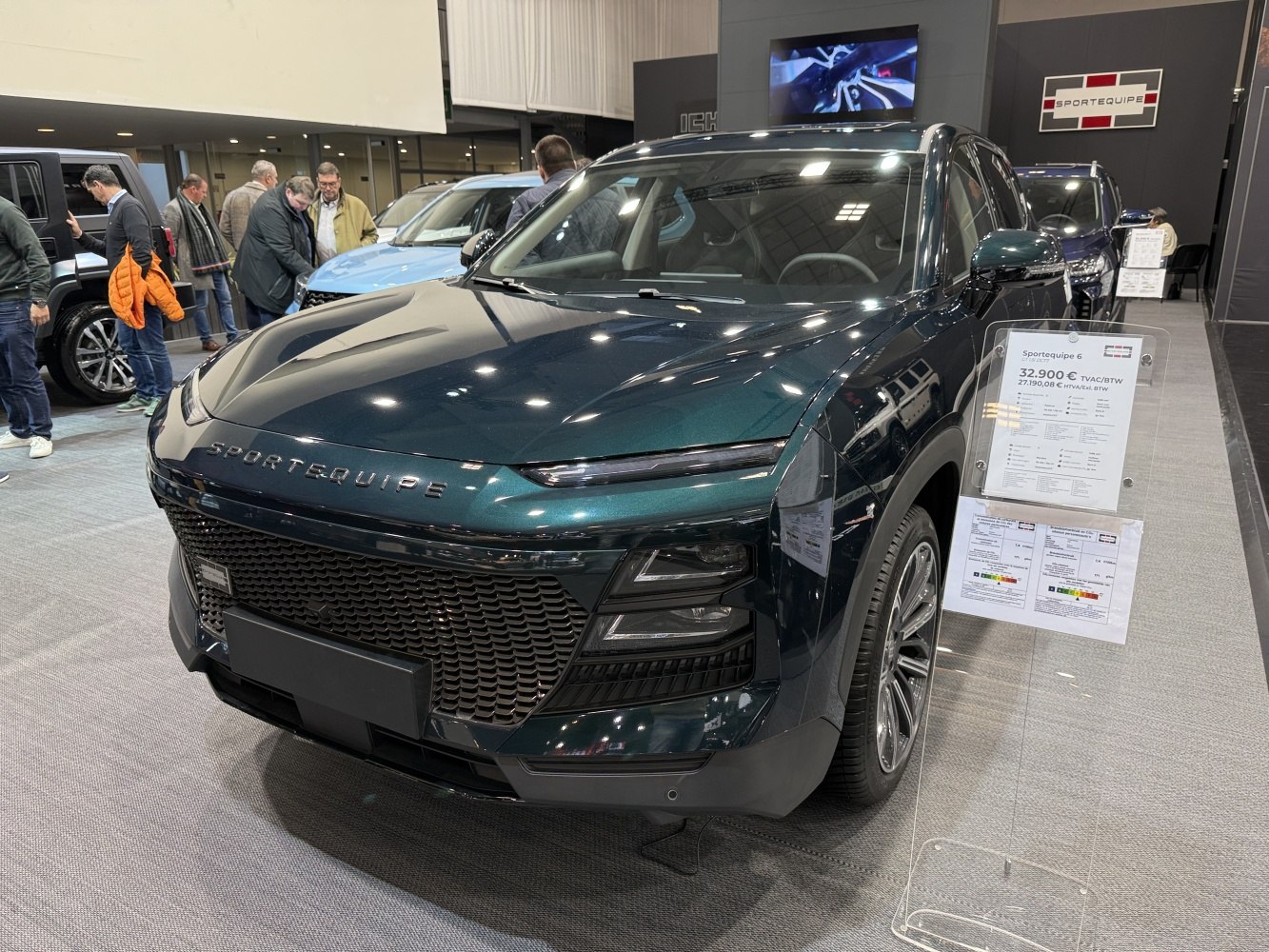 SUV front end with large grille and distinctive LED headlights