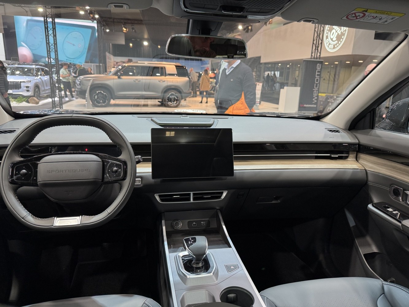 Modern car interior with digital dashboard and central touchscreen