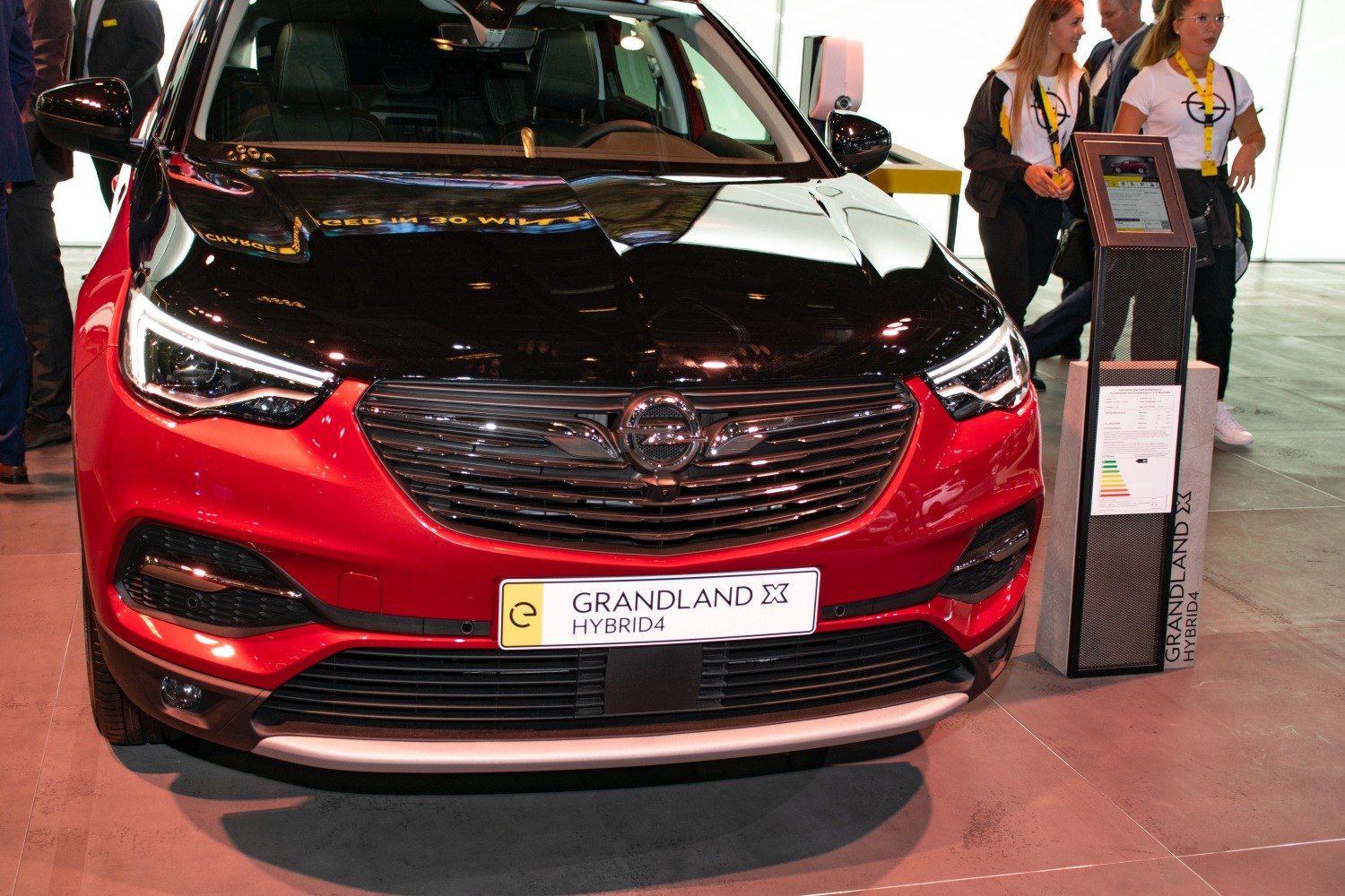 Front view with LED headlights and chrome-accented grille
