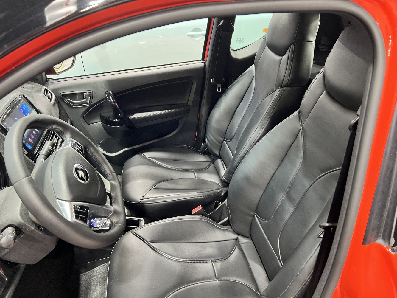 Black leather seats and modern dashboard interior