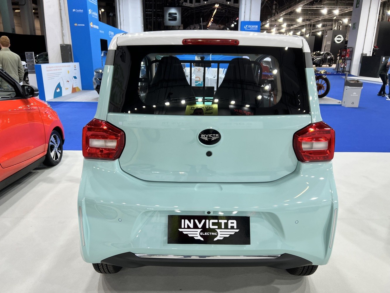 Rear view of compact electric vehicle with modern taillights and clean styling