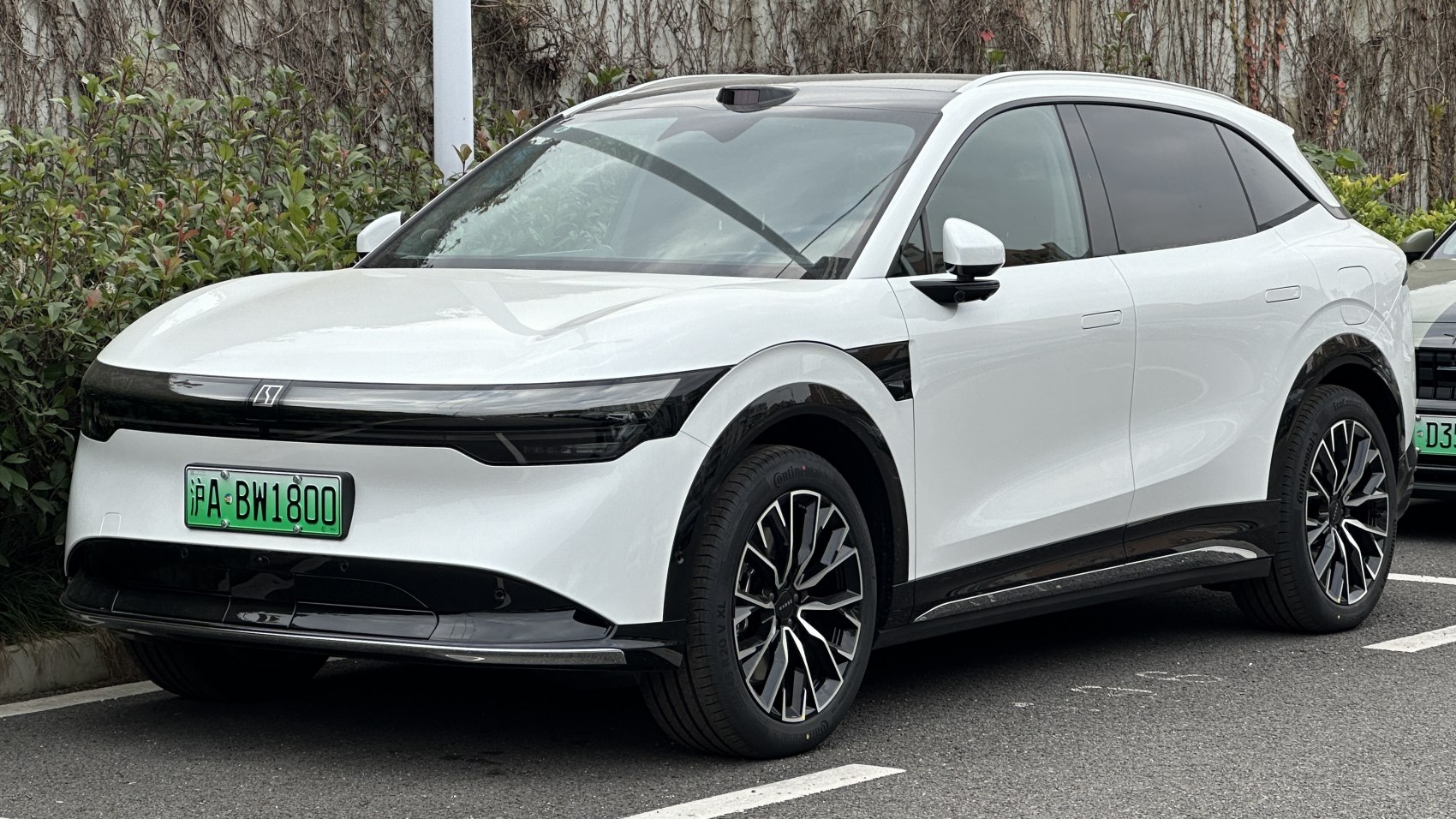 Sleek front view with modern headlights and aerodynamic design.