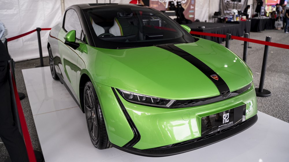 Sleek front design with sharp LED headlights and black racing stripe