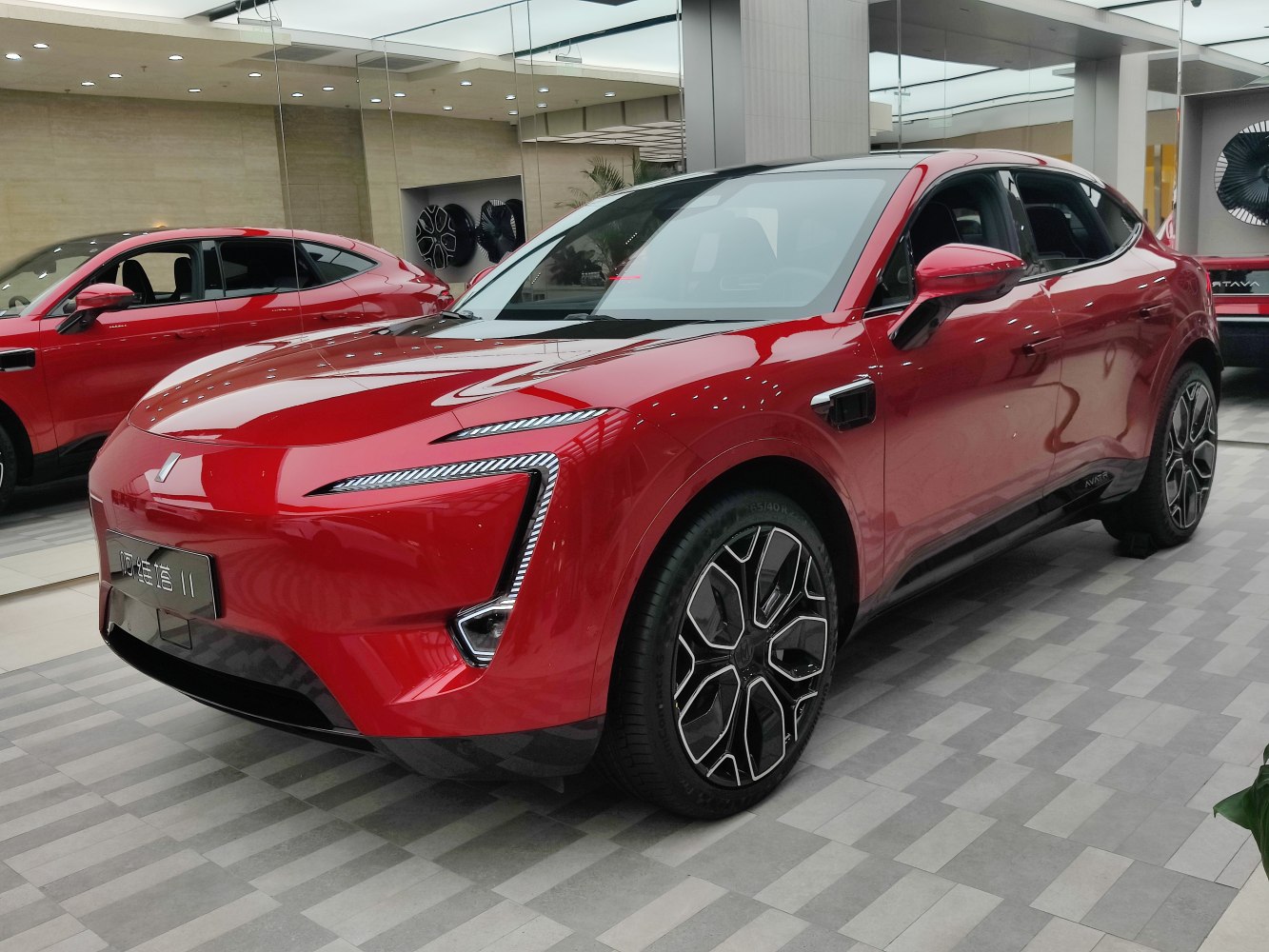Futuristic LED headlights and aerodynamic sleek SUV exterior.
