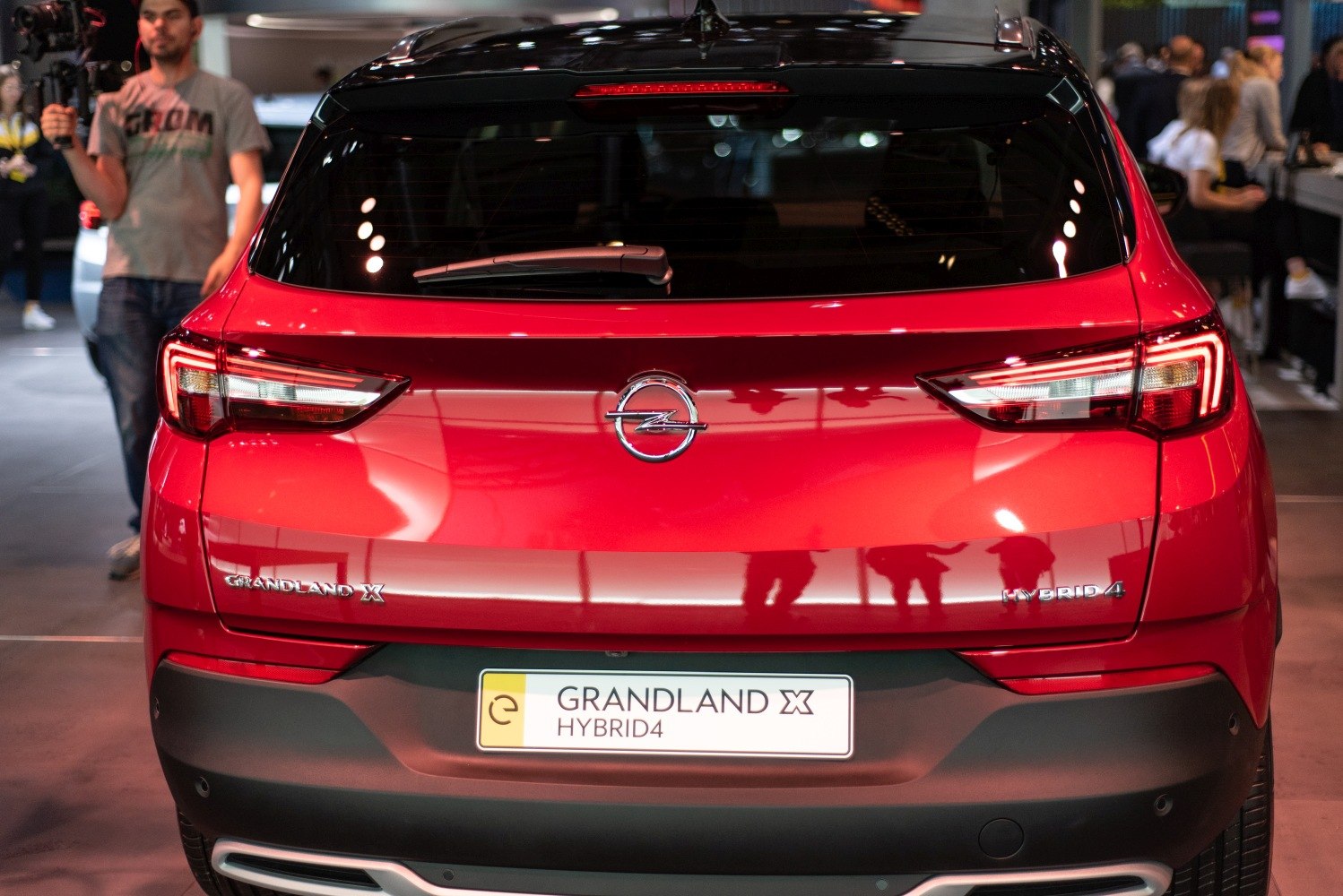 Rear view with Hybrid4 badge and distinct taillights.
