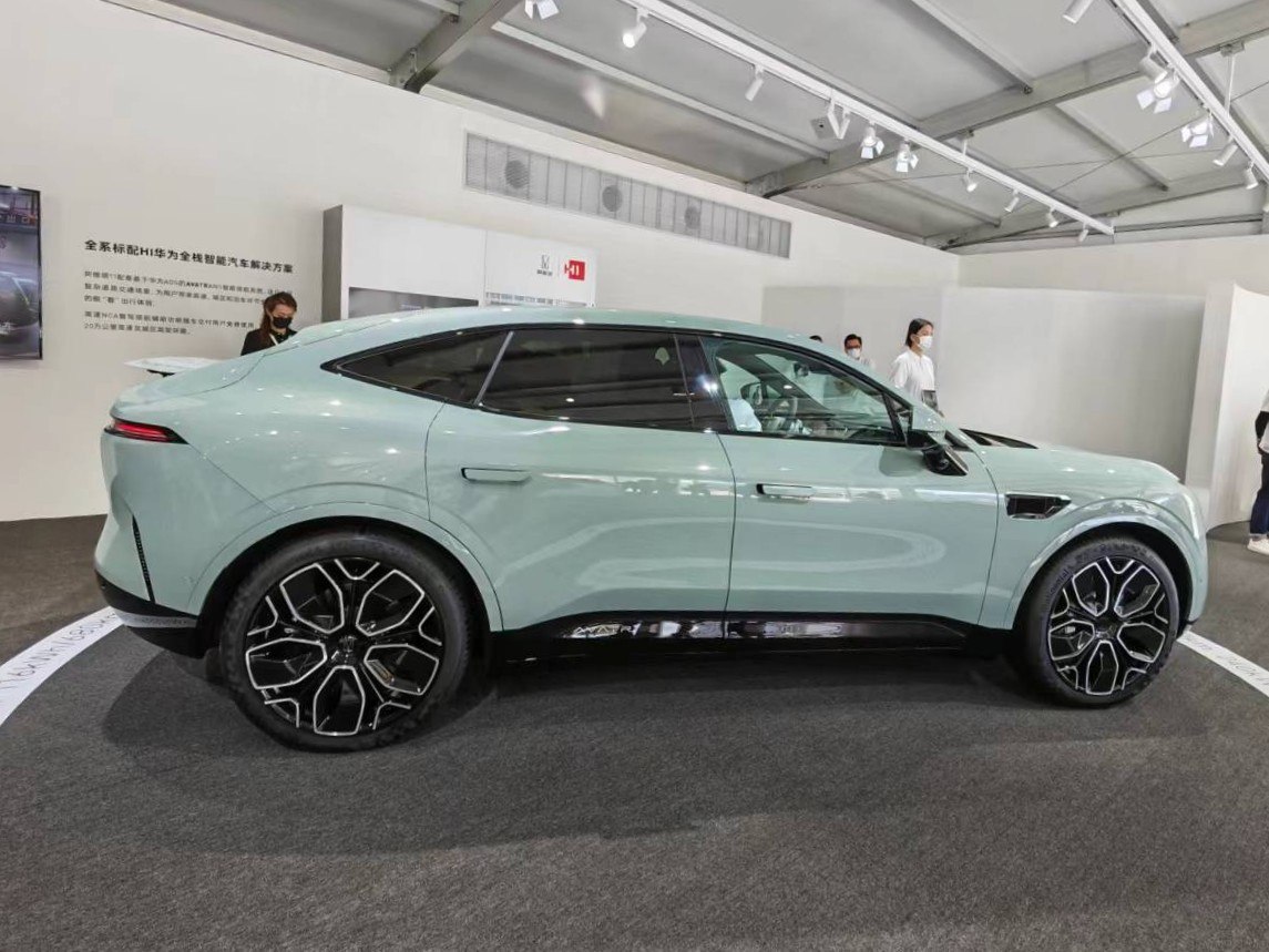 Side profile of sleek electric SUV with large alloy wheels