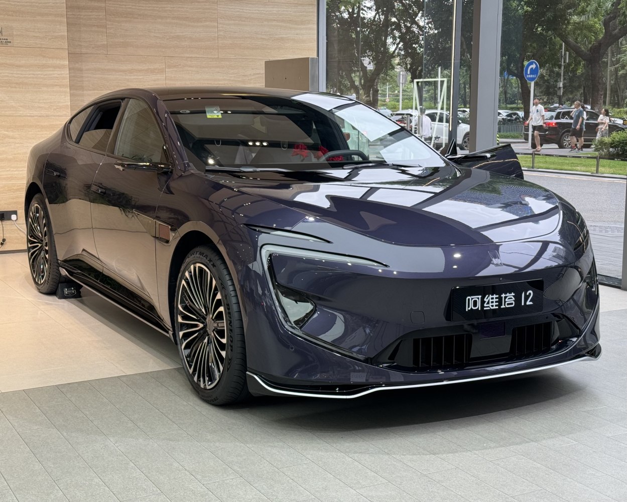 Aerodynamic front fascia with integrated LED lights and stylish multi-spoke alloy wheels