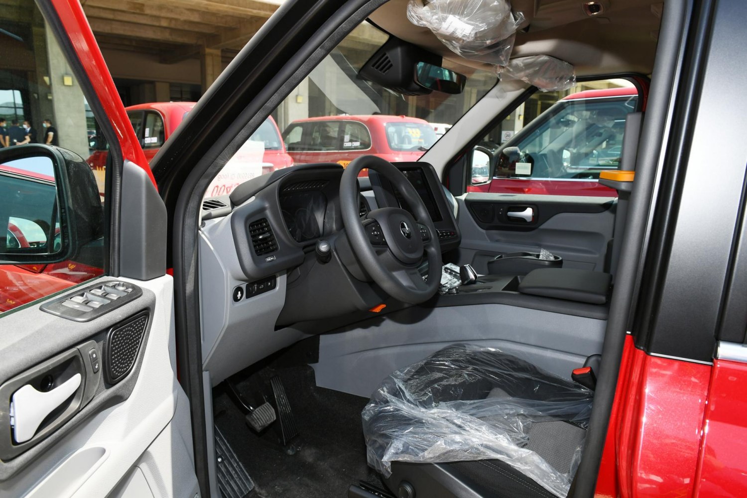 Modern car interior with steering wheel and digital dashboard