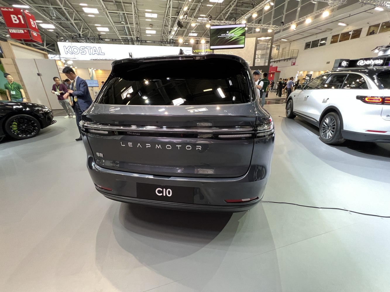 Rear view of electric SUV with continuous light bar and sleek hatch design