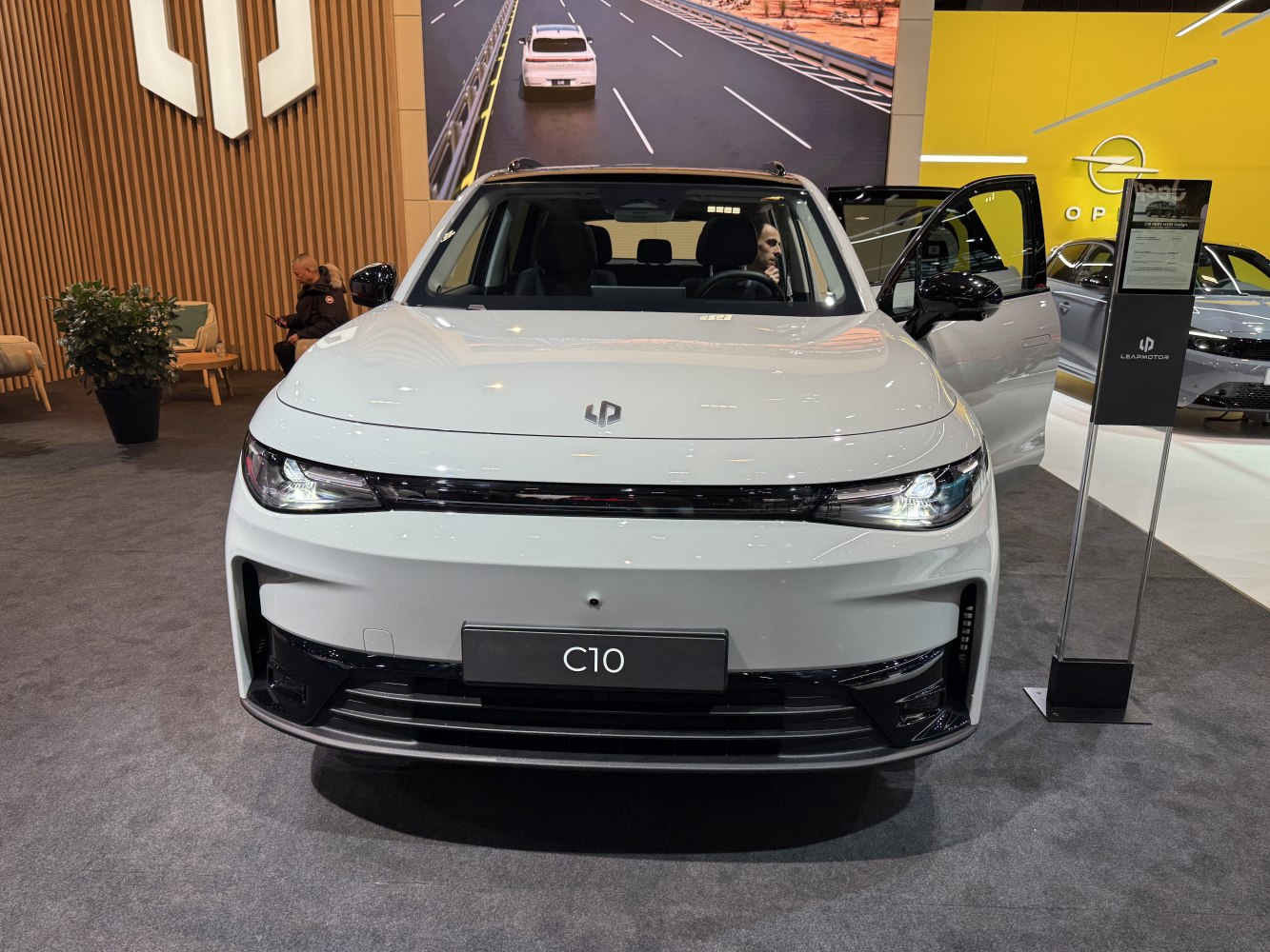 Front view with sleek LED headlights and distinctive grille