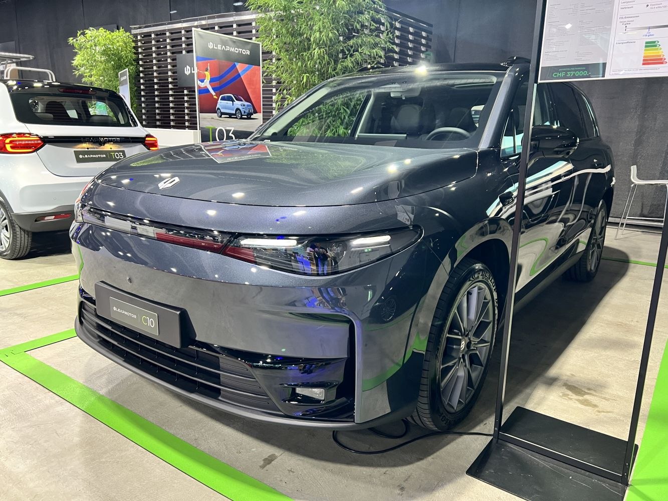 Front view of electric SUV with sleek LED headlights and aerodynamic body