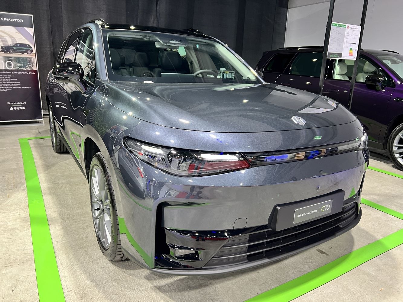 Front view of a sleek car with LED headlights and smooth front fascia
