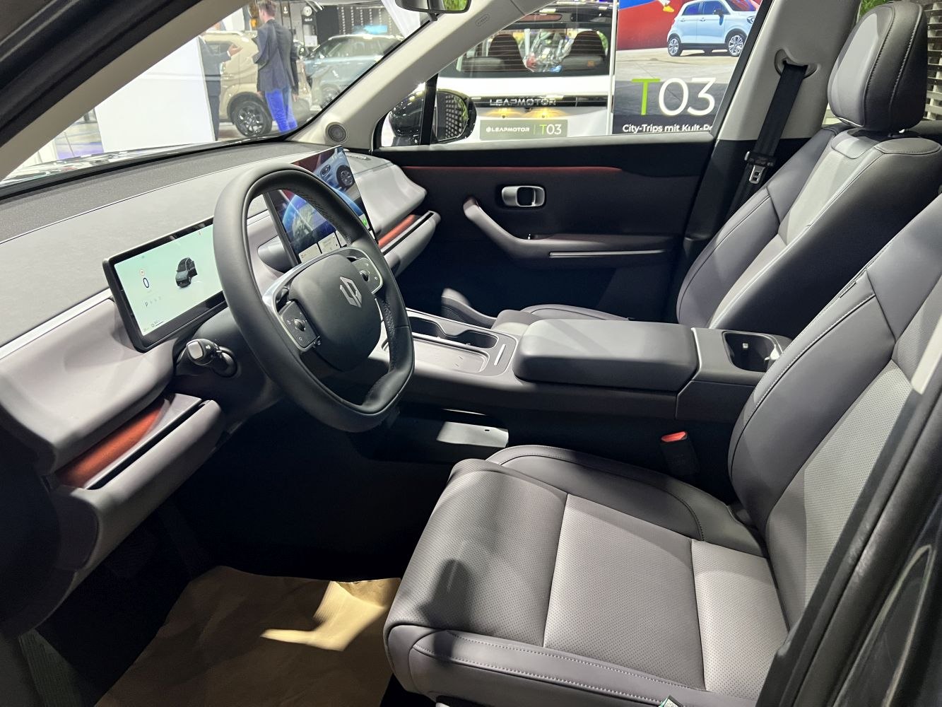 Dual digital displays and two-tone premium seats in car interior