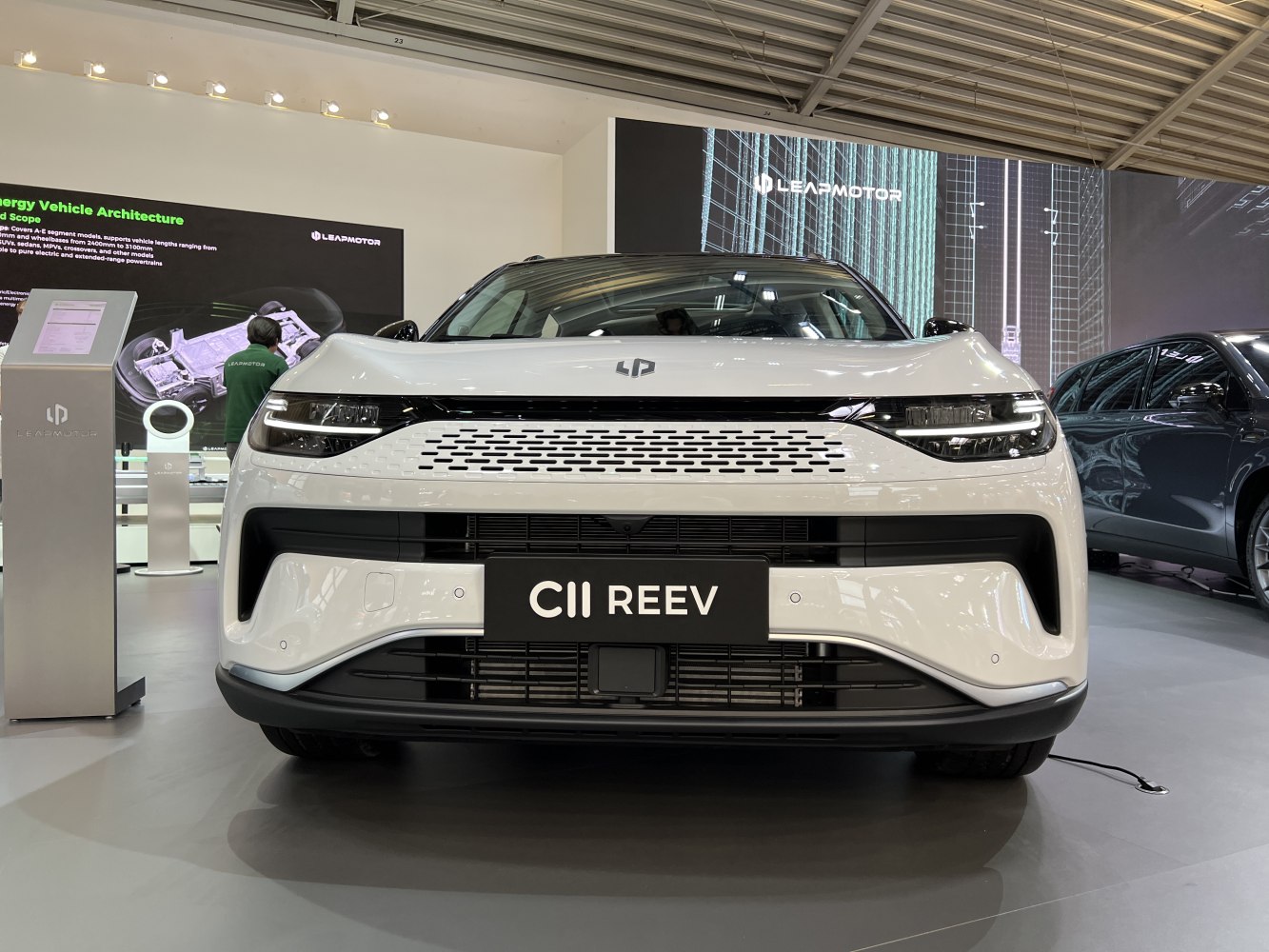 Front view of SUV featuring modern LED headlights and perforated grille