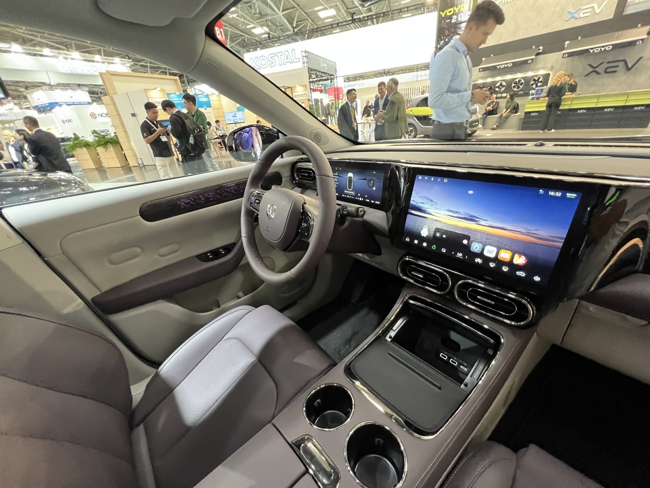 Modern digital dashboard and large central touchscreen in vehicle interior