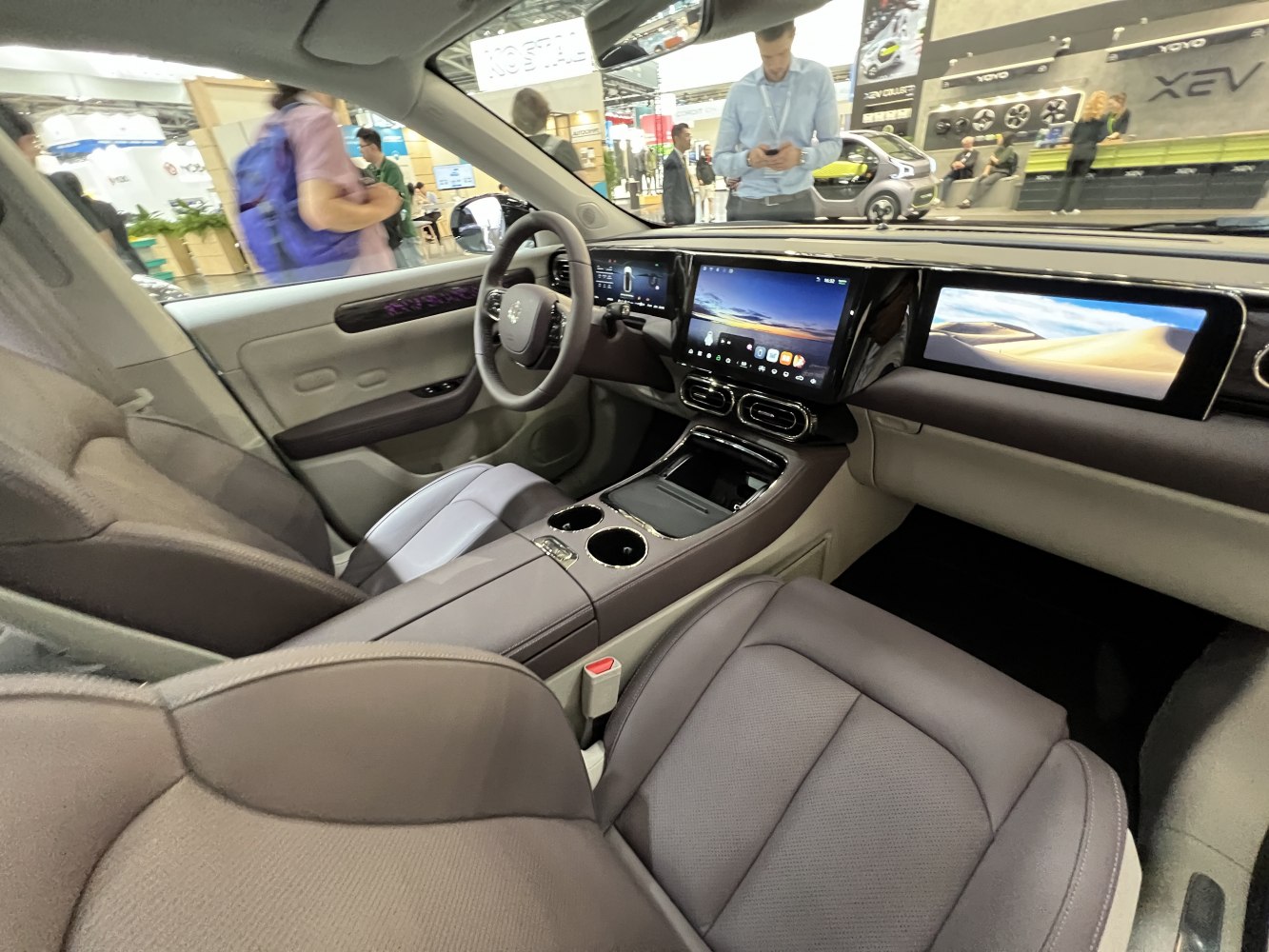 Dual large digital displays and modern cockpit with premium seats