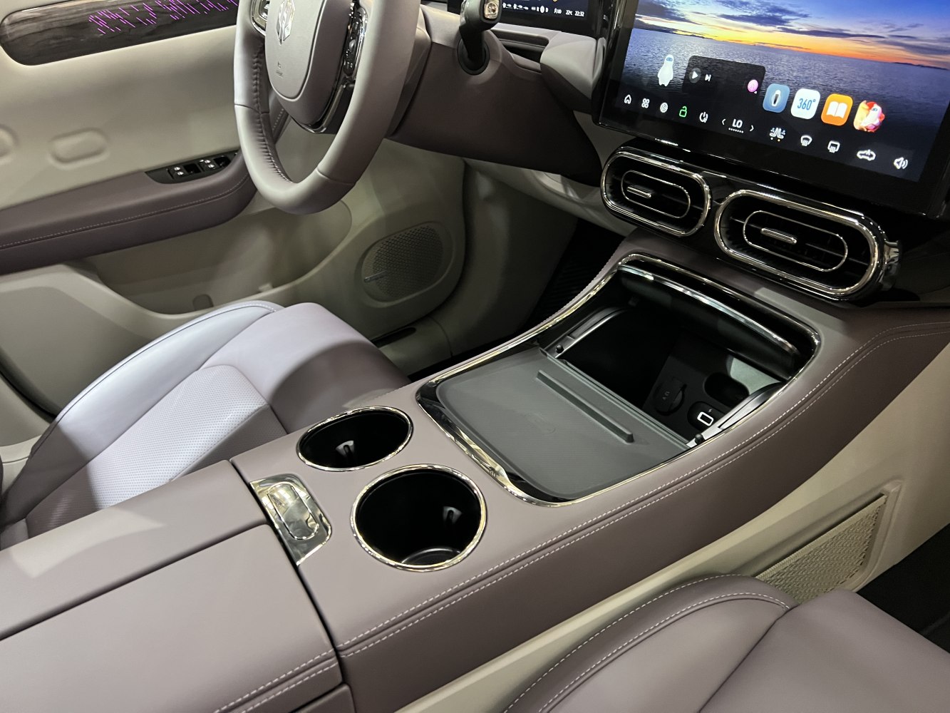 Modern car interior with touchscreen and dual cup holders