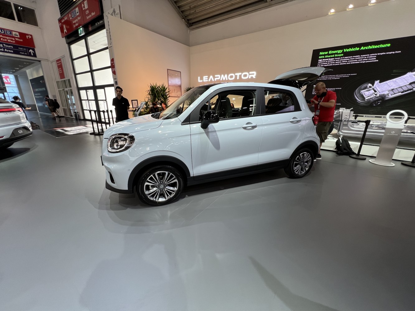 Side profile of compact electric hatchback with unique headlights