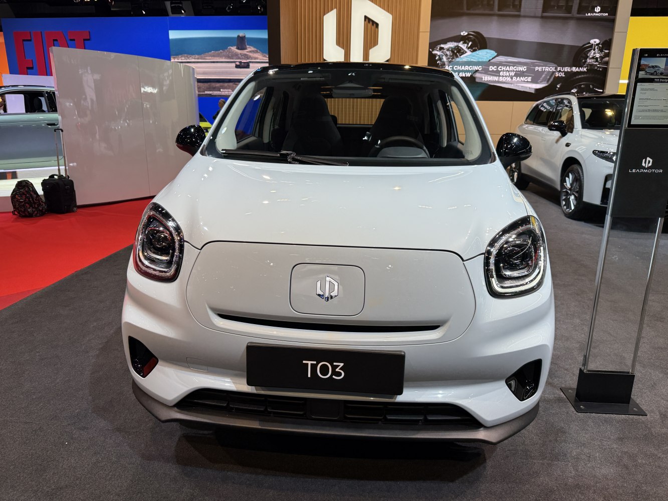 Compact electric car front with LED headlights