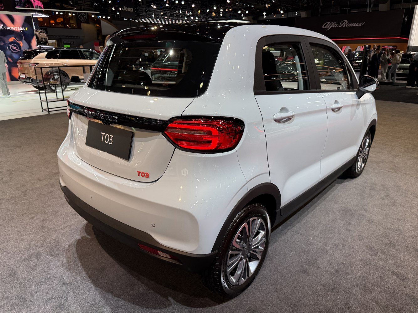Compact electric hatchback rear view with modern taillights