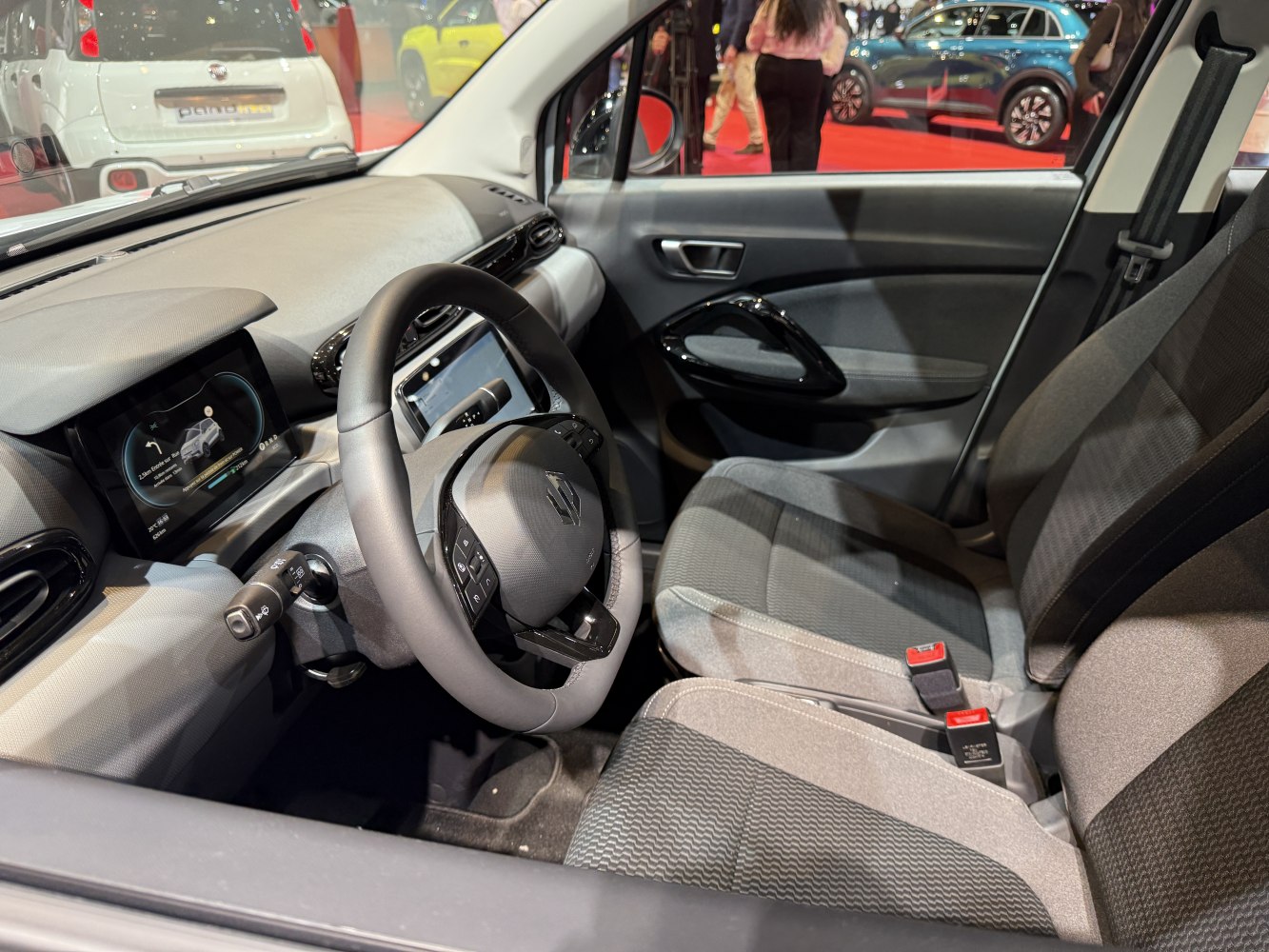 Modern electric car interior with digital cockpit and ergonomic seats