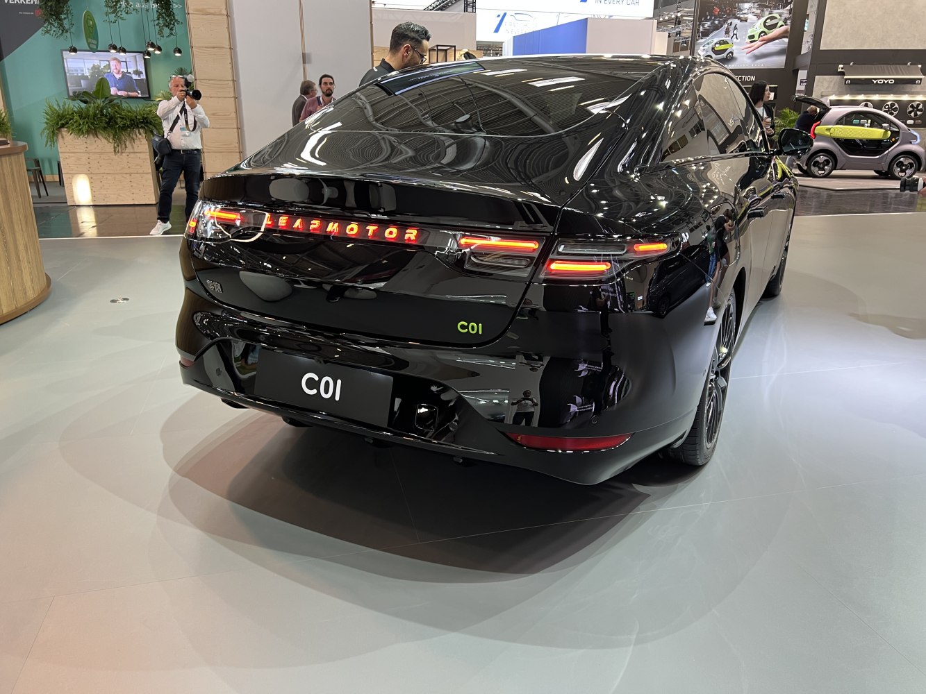 Sleek rear design with illuminated badge and modern tail lights