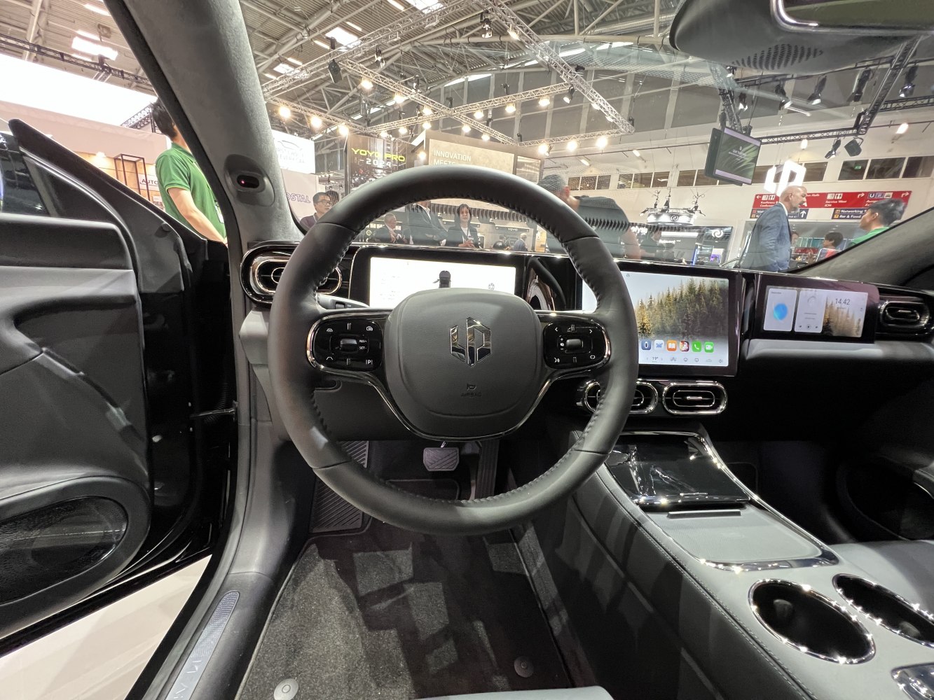 Digital dashboard and touchscreen center console with modern steering wheel
