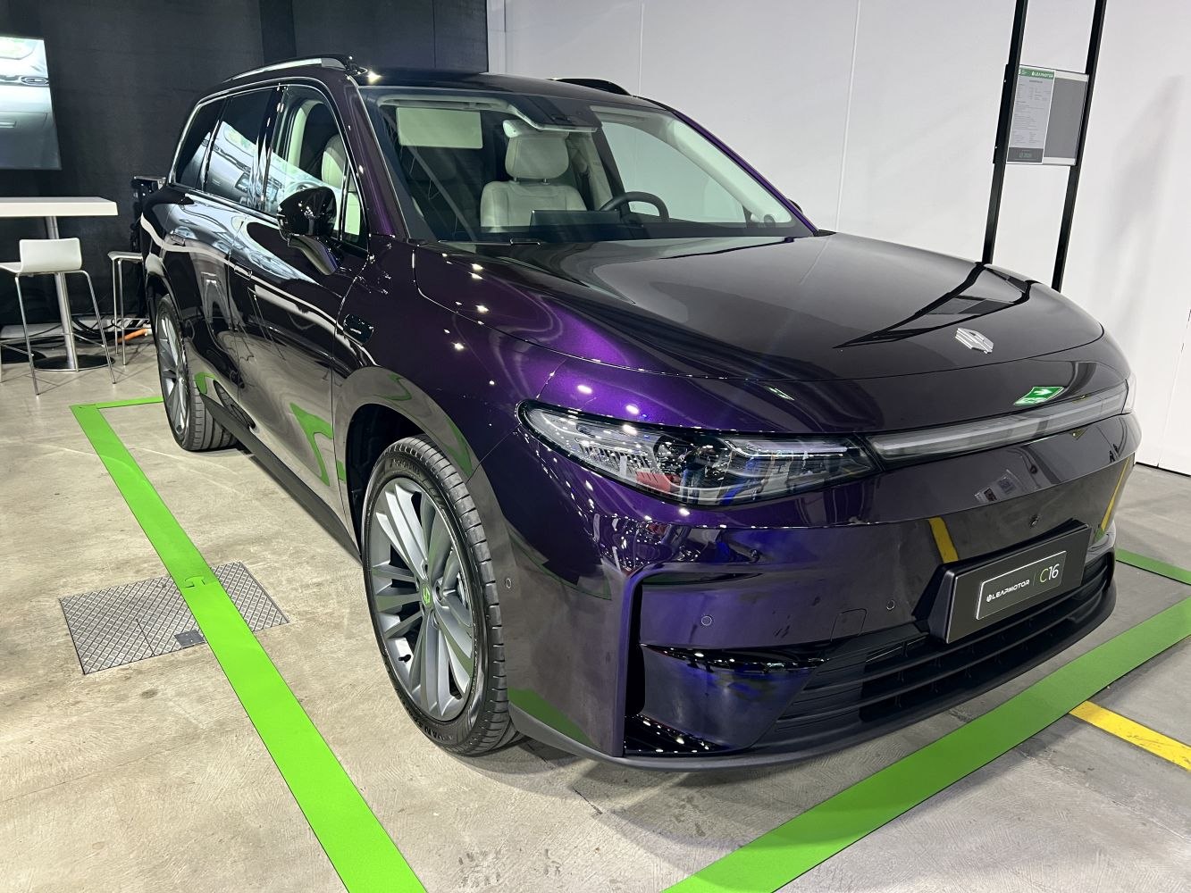Front side view with LED headlights and sleek body design