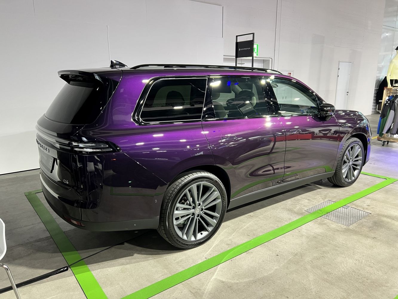 Purple SUV with sleek side profile, tinted windows, and modern rear design.