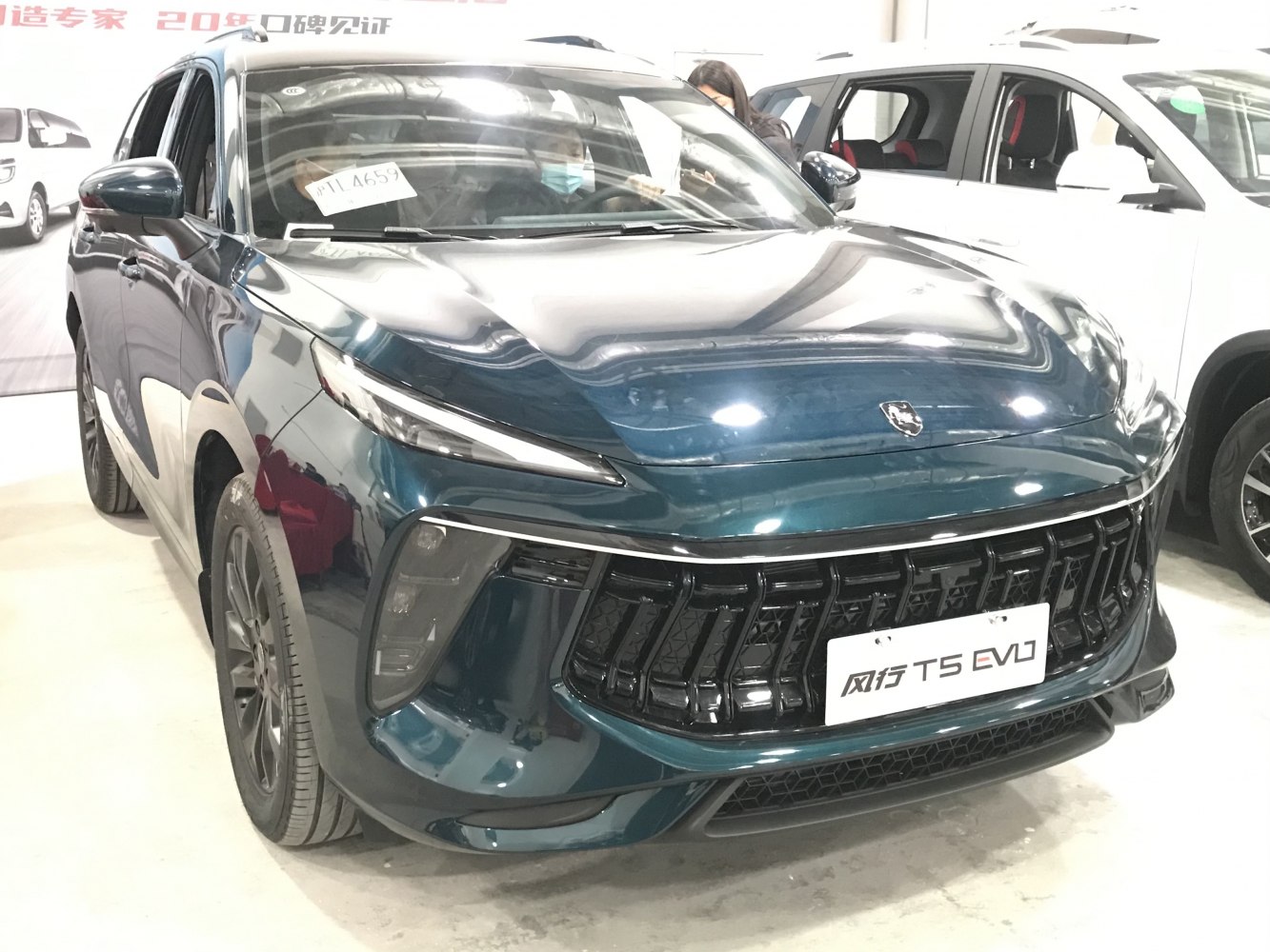 Front view with sharp LED headlights and large modern grille design