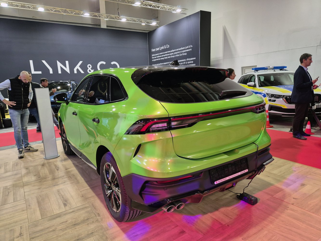 SUV rear view with sleek taillights and dual exhaust pipes