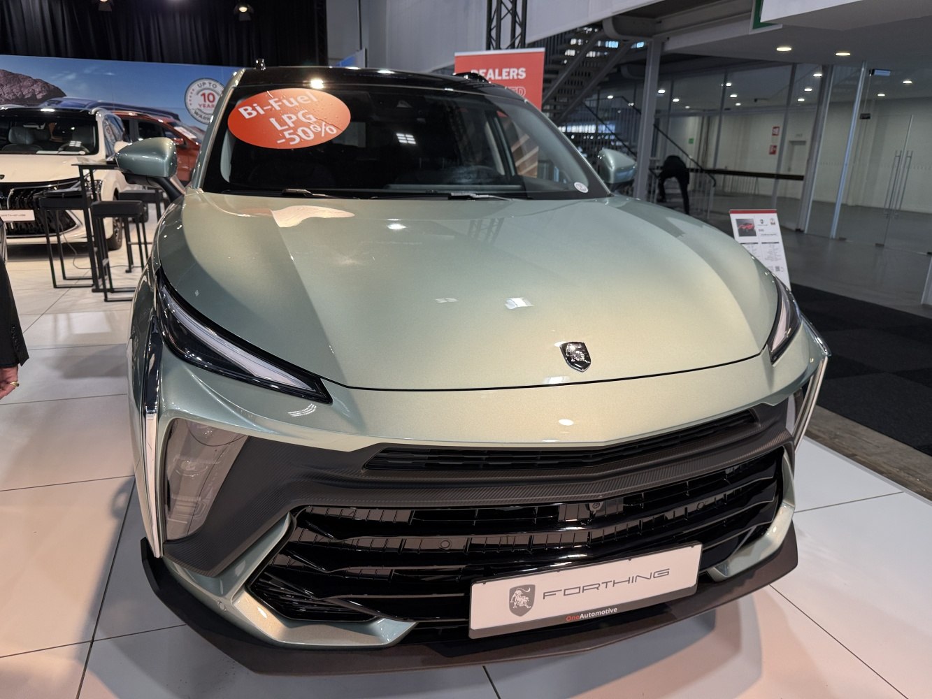 Sleek front with LED lights and bold grille
