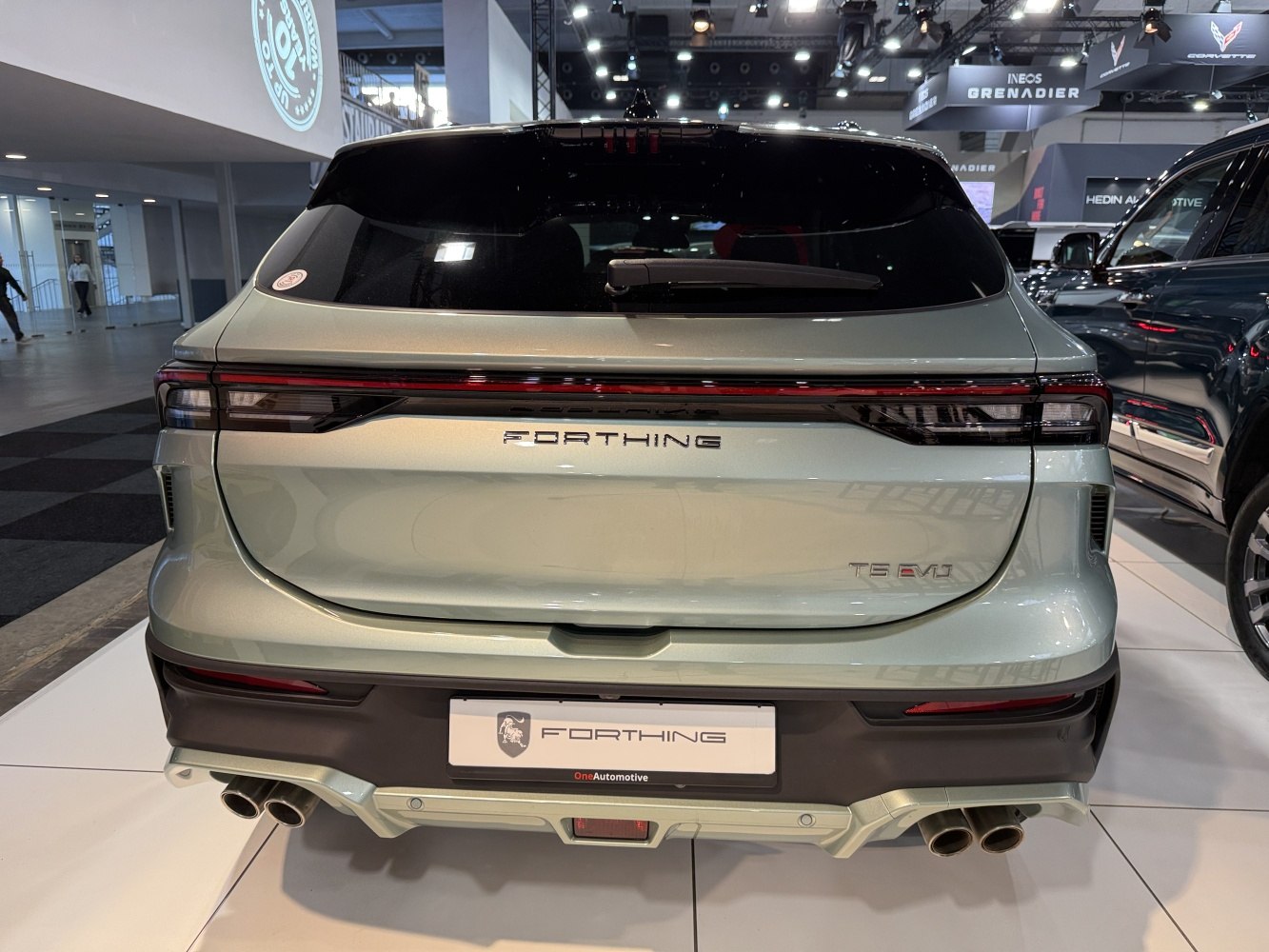 LED taillights and quad exhaust on SUV rear
