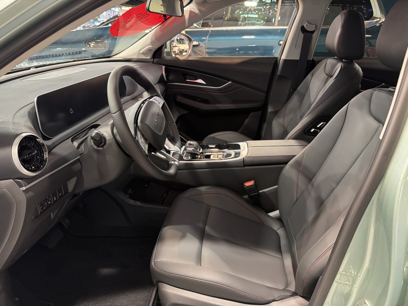 Modern steering wheel, dashboard, leather seats interior