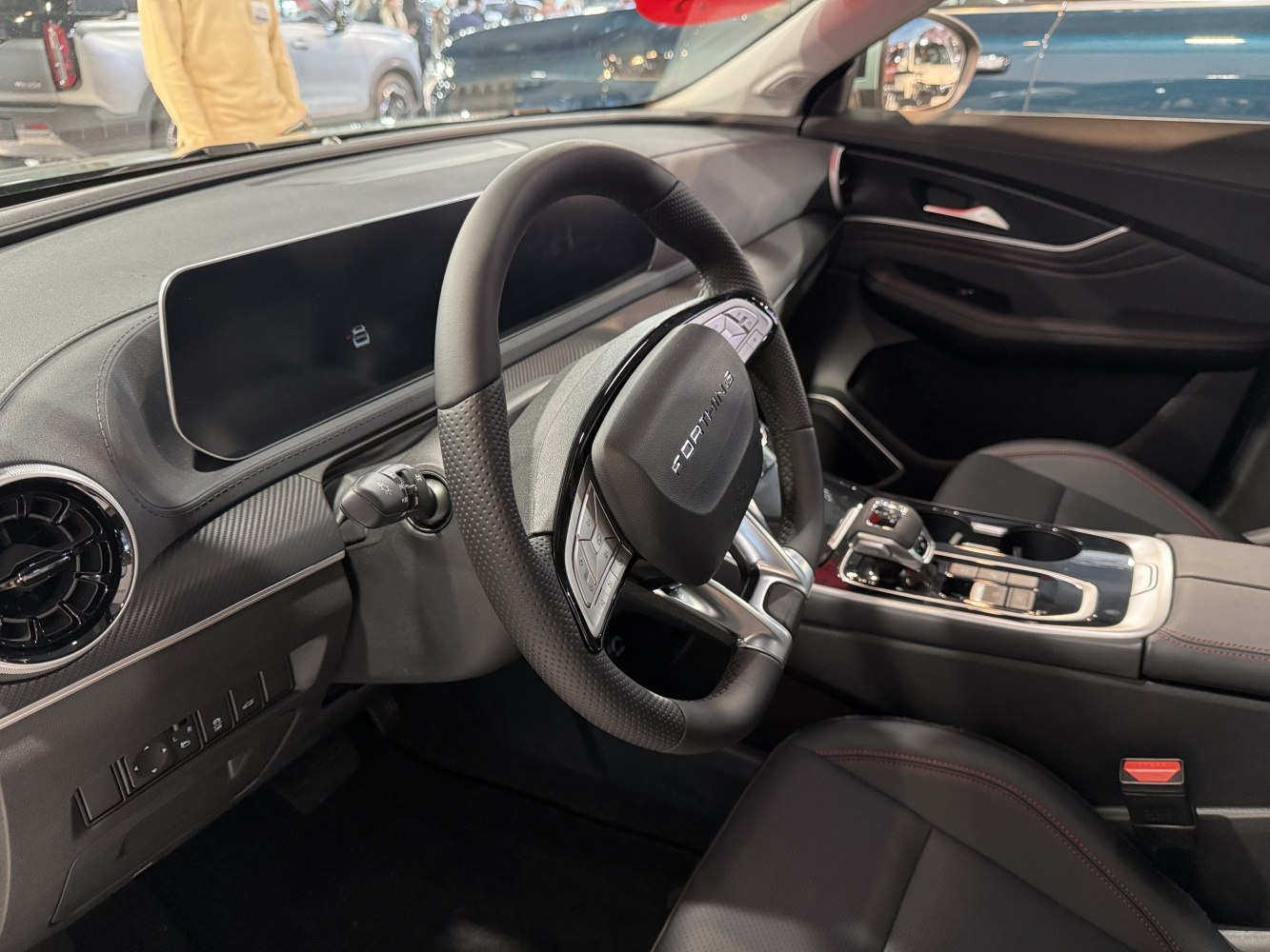 Digital dashboard, multifunction steering wheel with controls, modern center console