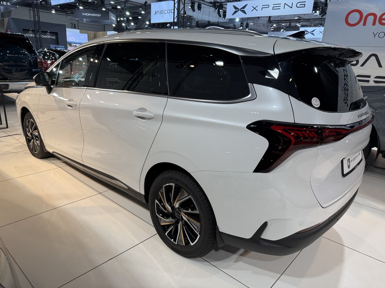 Rear side profile with distinctive tail lights and alloy wheels