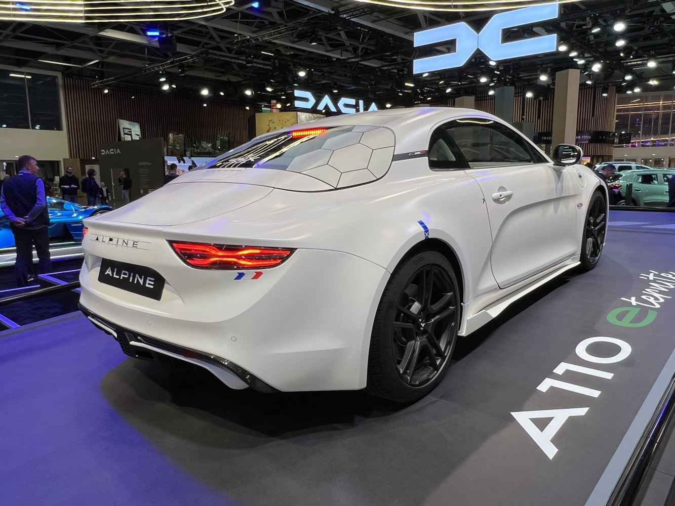 Sleek rear and side view with unique hexagonal rear window pattern