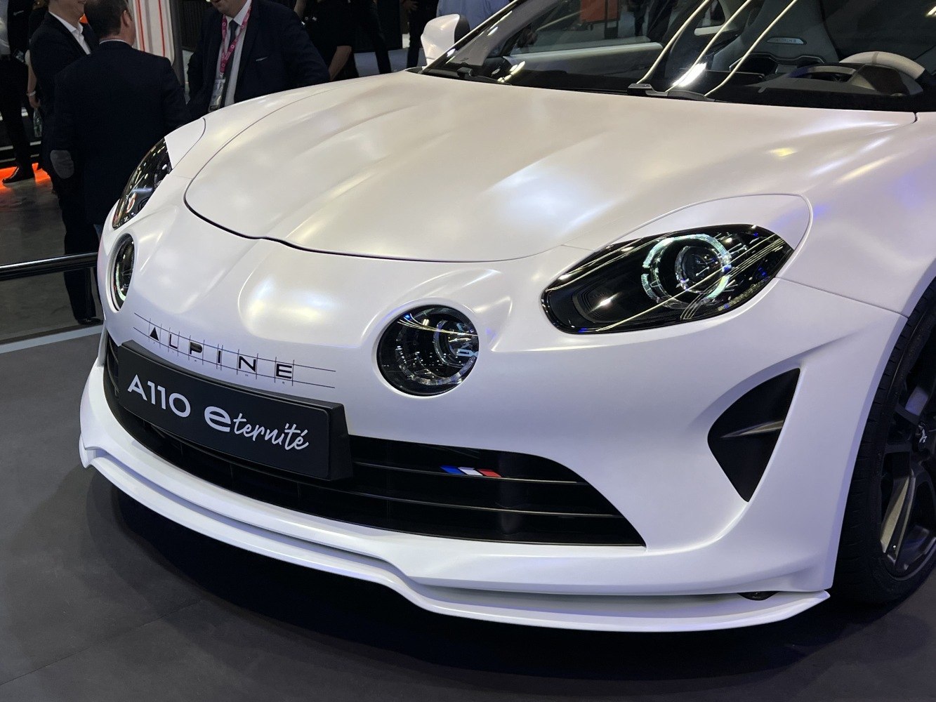 Front view with unique circular and elliptical headlights, aerodynamic bumper and grille.