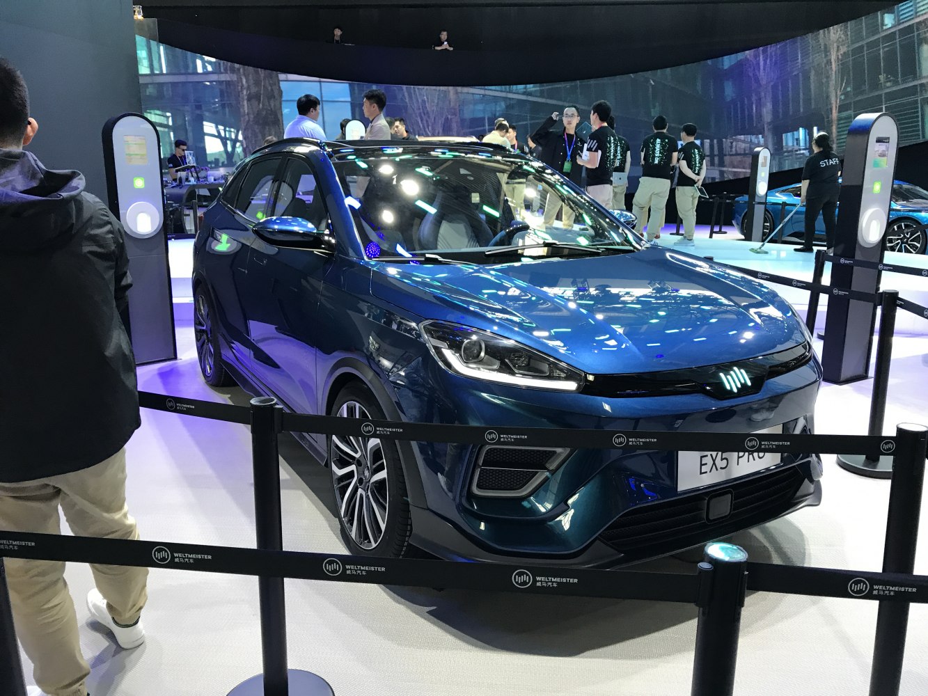 Sleek electric SUV with LED headlights and aerodynamic wheels.