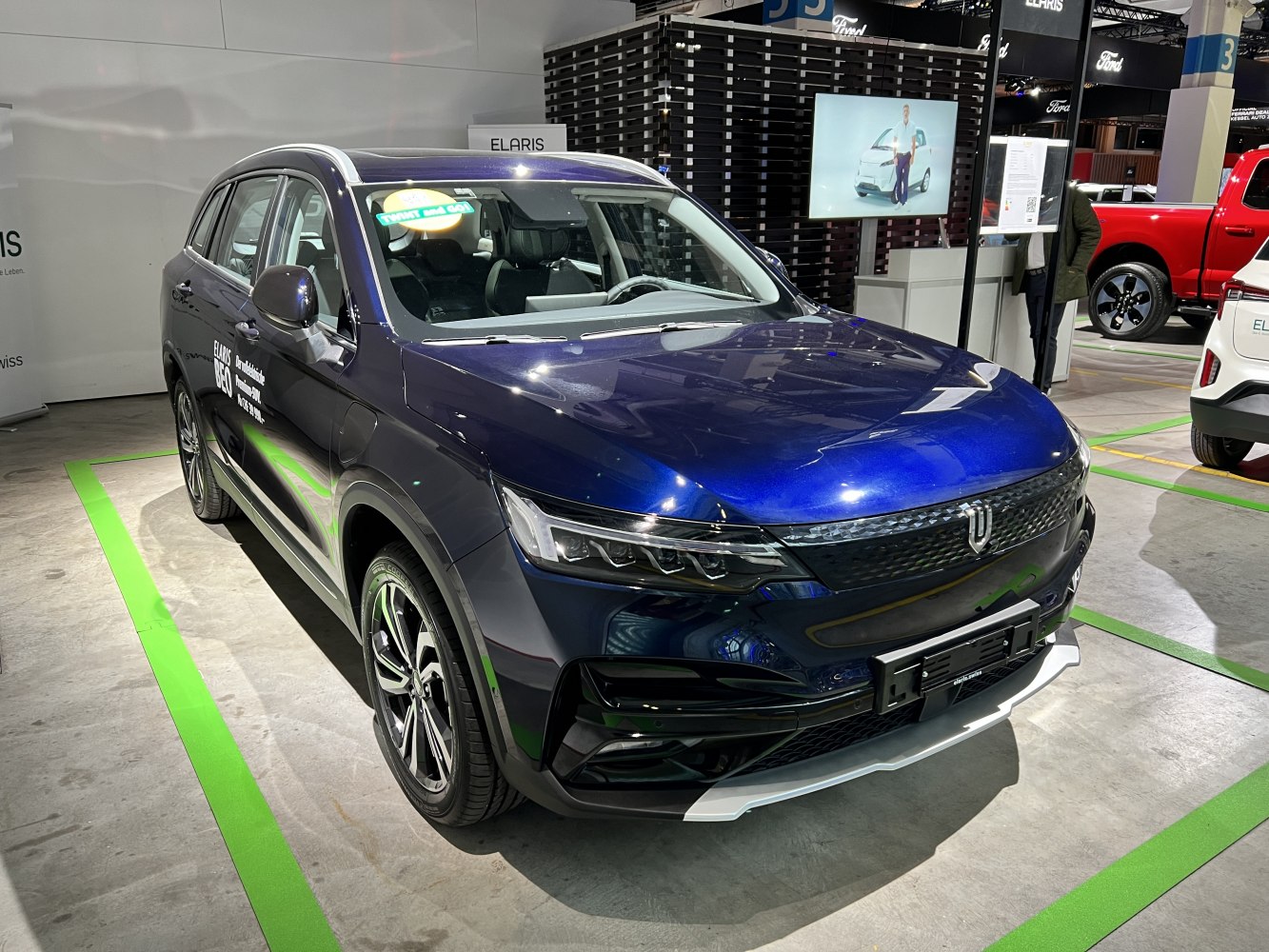 Front and side exterior of electric SUV with LED headlights