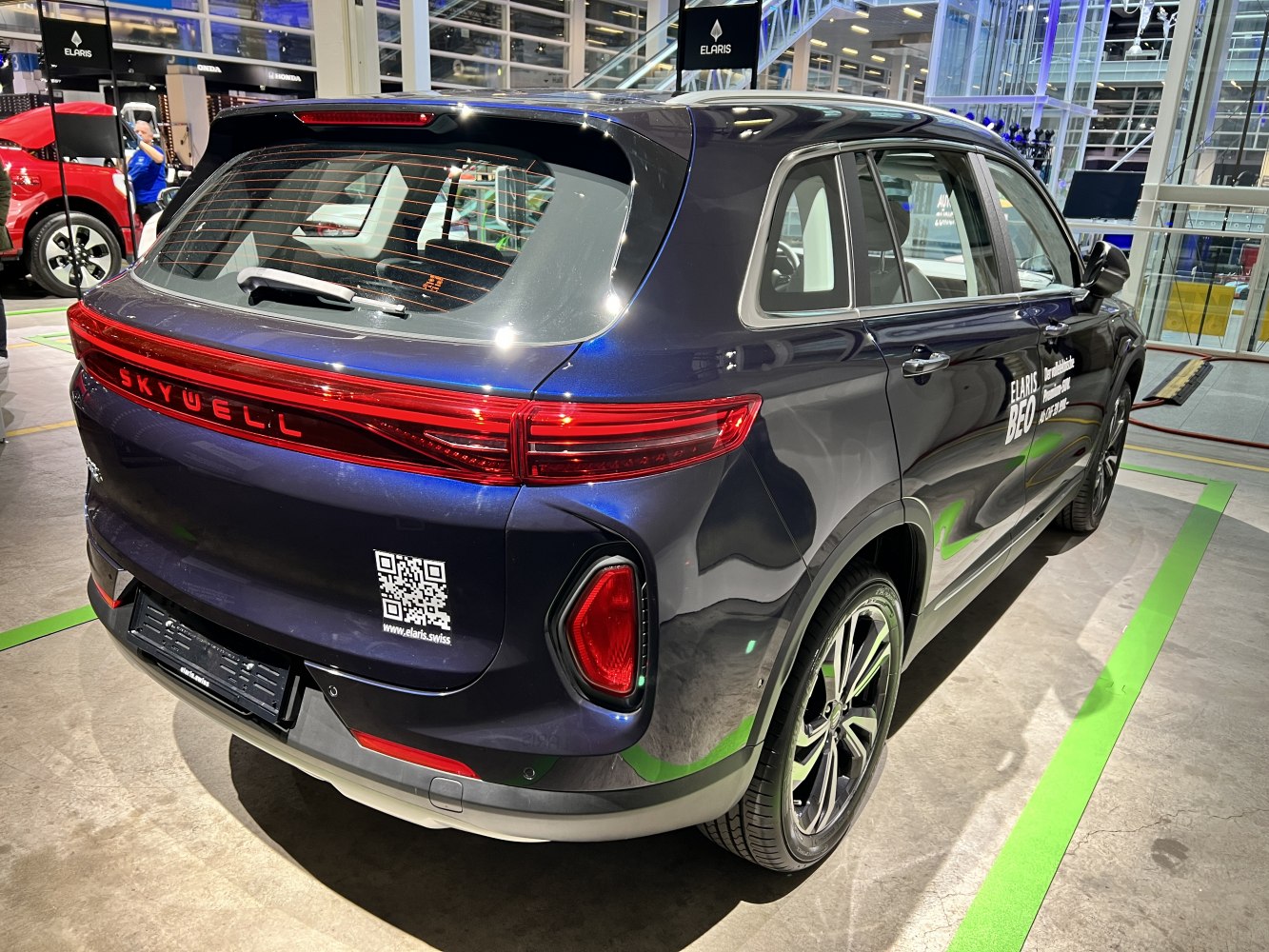 Rear design with continuous Skywell taillight bar and rear window wiper.