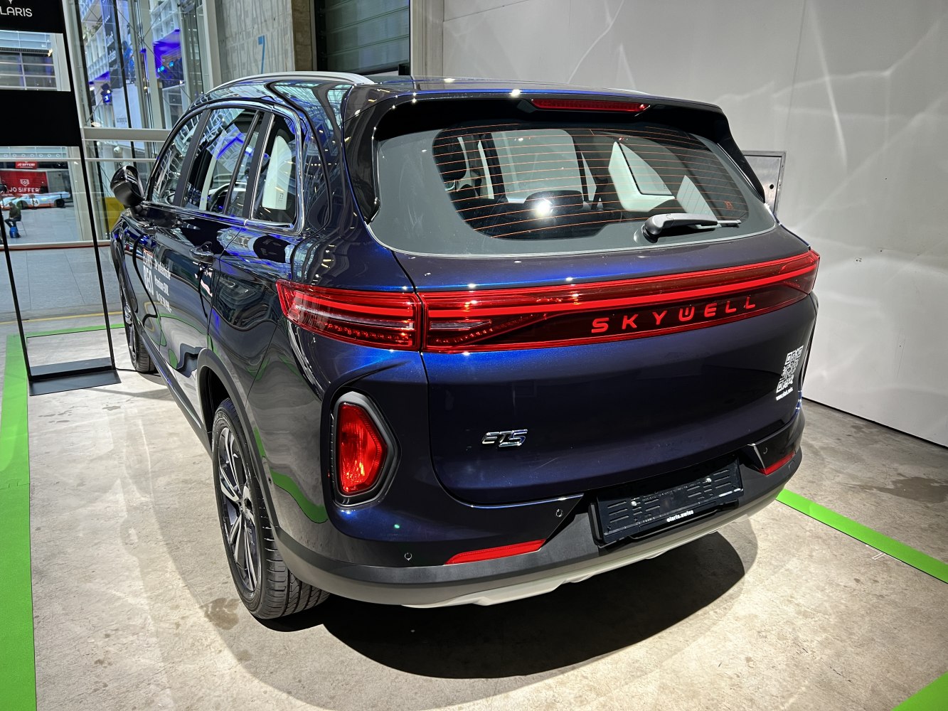 Rear view with connected Skywell LED light bar and modern tail light design.