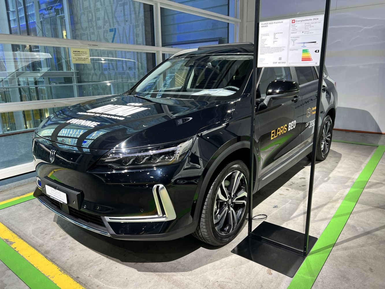 Electric SUV with LED headlights and stylish multi-spoke wheels