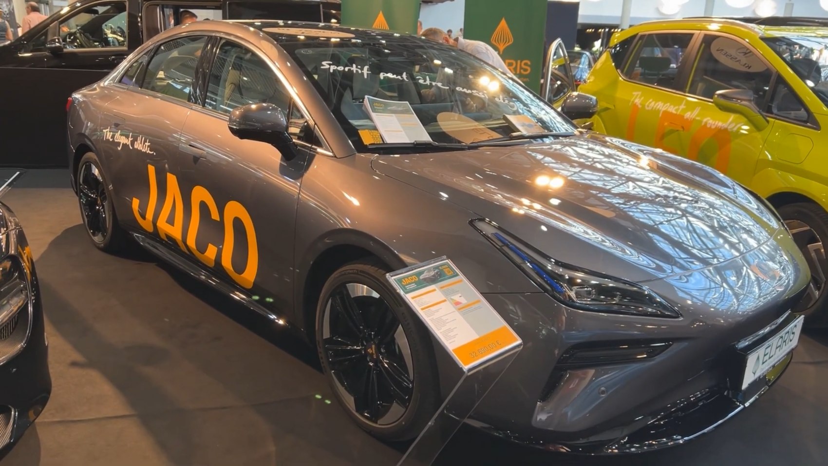 Electric sedan with sleek aerodynamic body and distinctive LED headlights