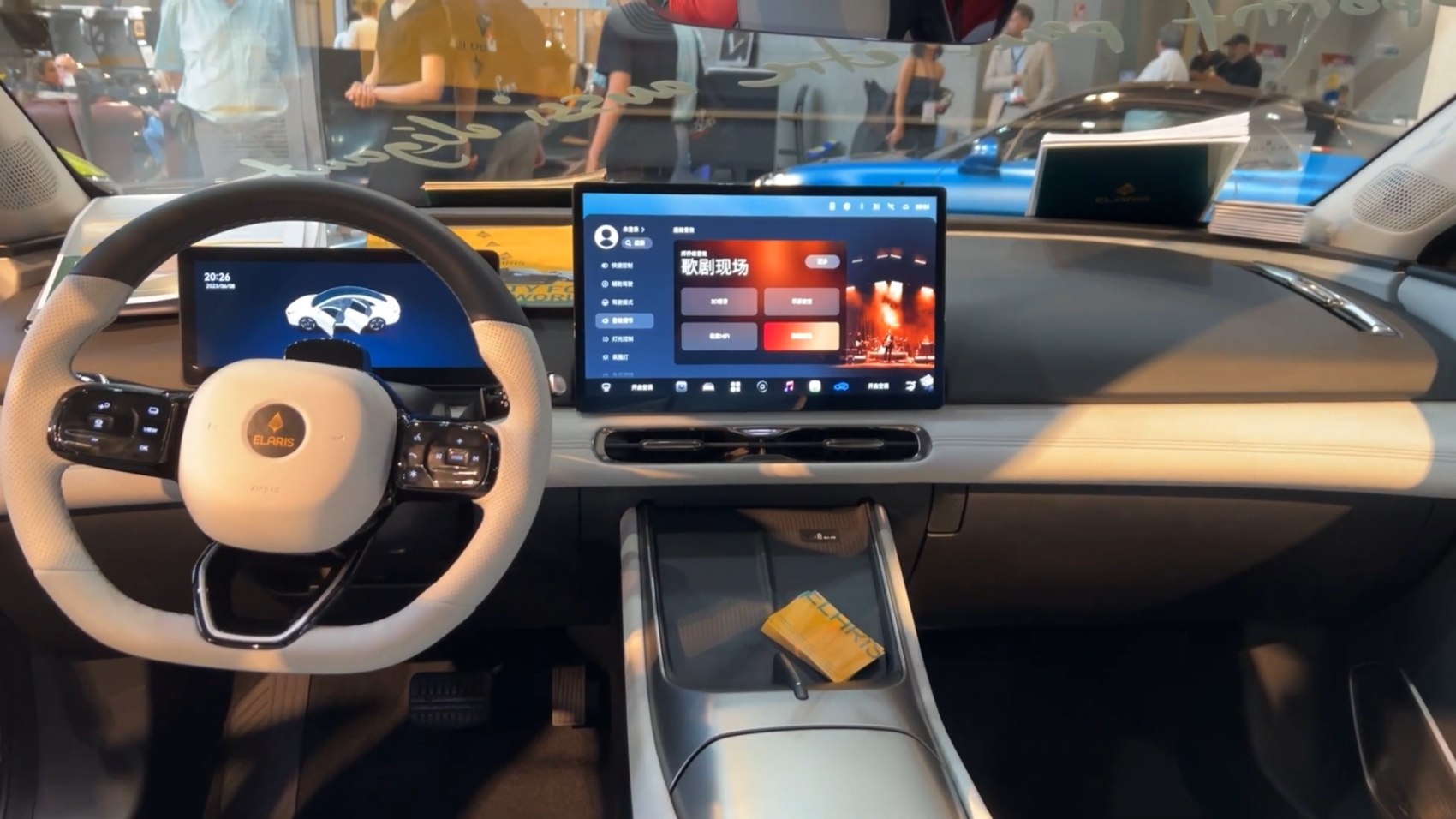 Dual digital displays and tech-centric dashboard with touchscreen and controls