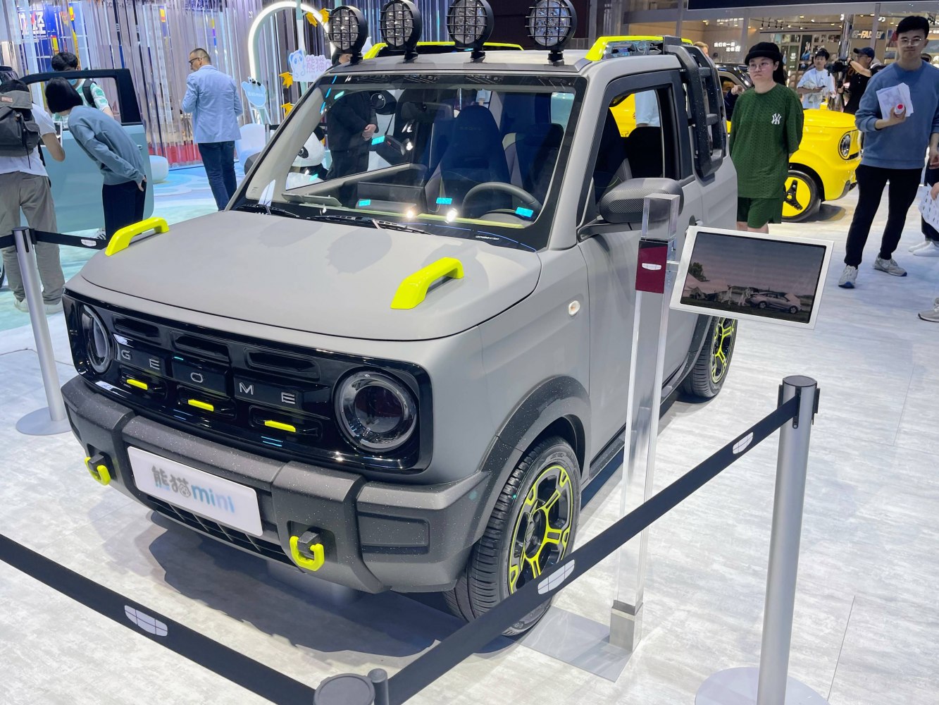 Compact electric crossover with rugged accents and roof spotlights