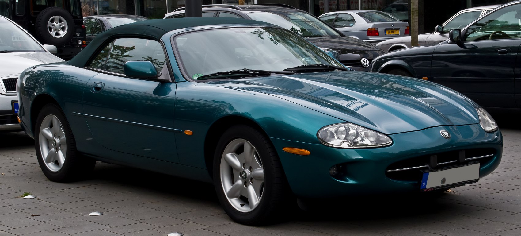 Sleek front side view of a classic convertible roadster.