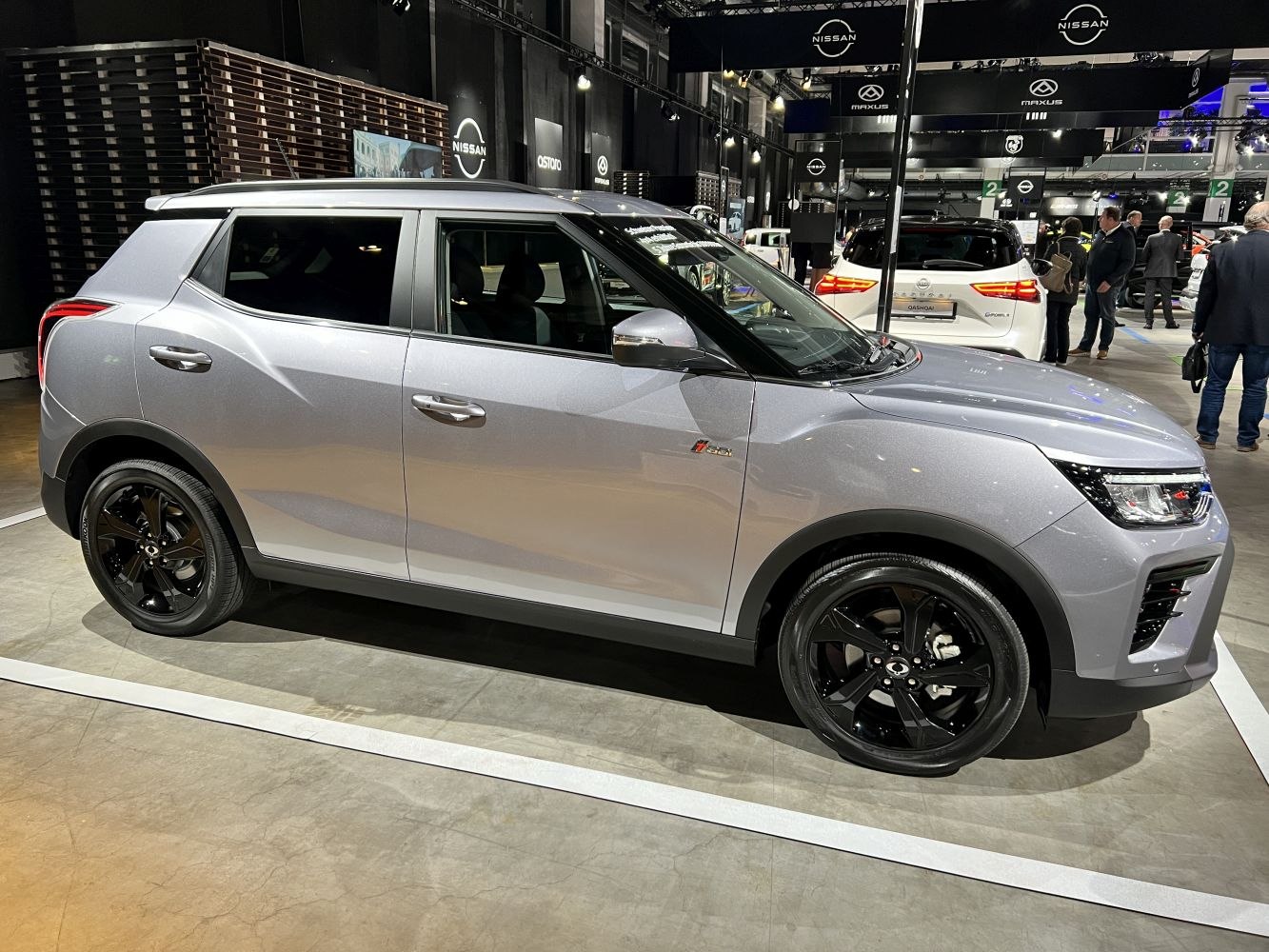 Side profile of SUV with black alloy wheels and modern exterior styling
